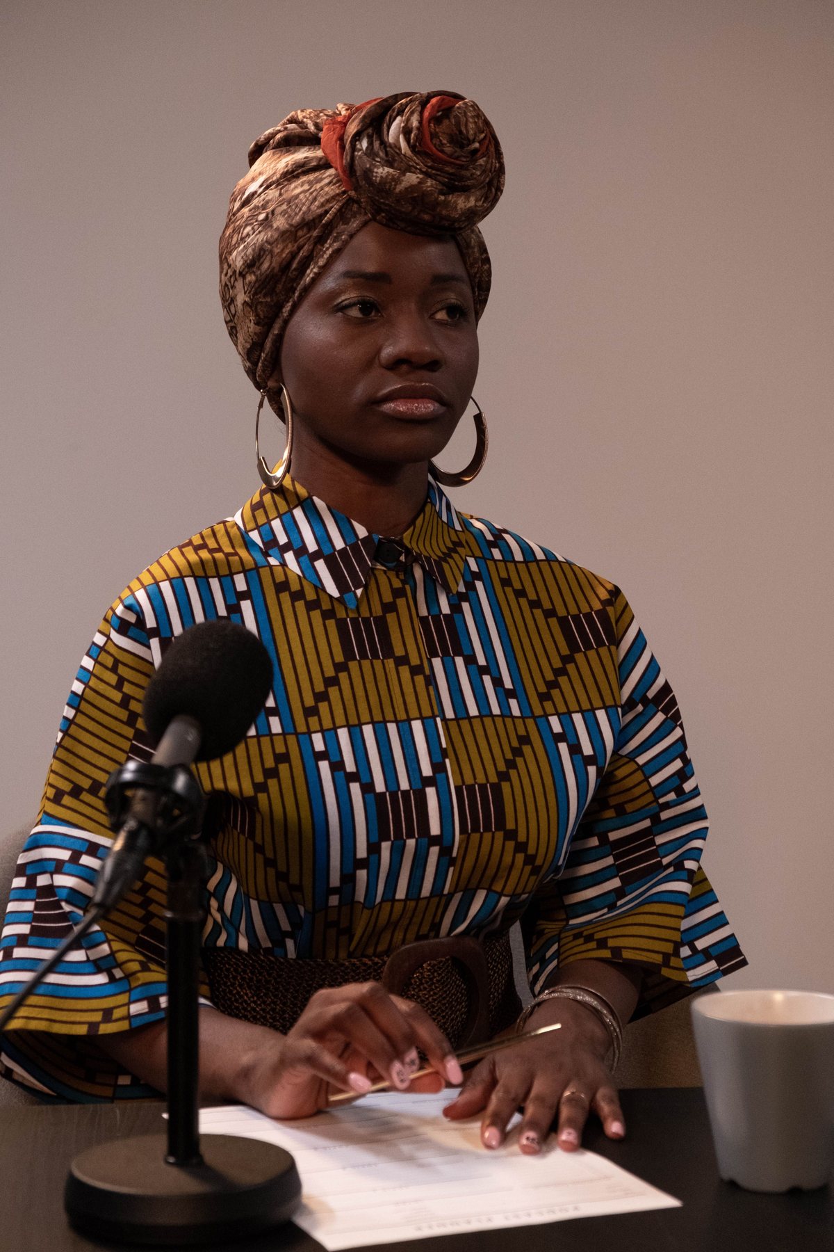 Presenter speaking in a recording studio